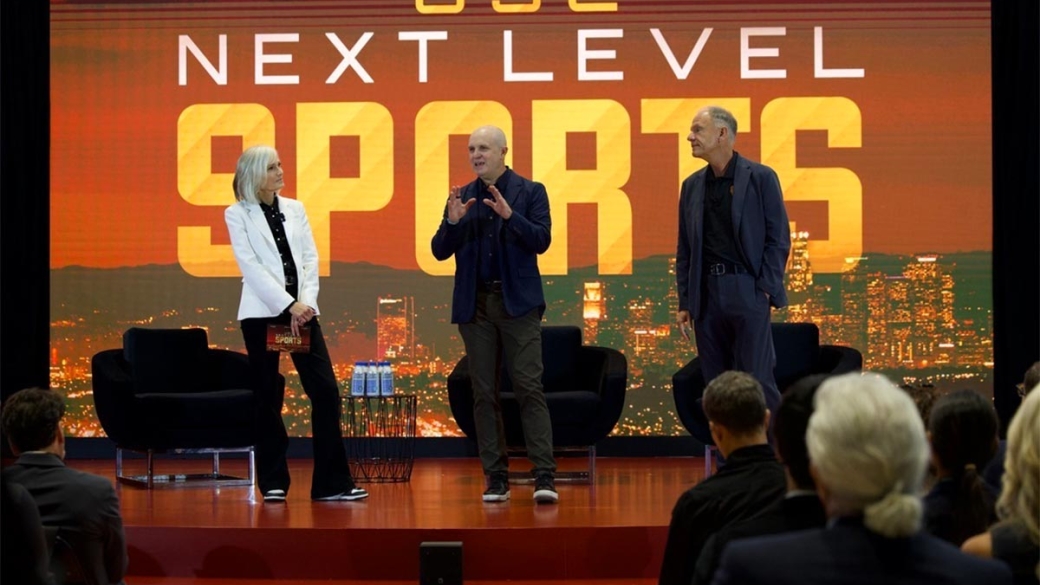 Bloomberg chief correspondent Jason Kelly, center, delivers opening remarks with USC Annenberg Dean Willow Bay and USC Marshall Dean Geoffrey Garrett.