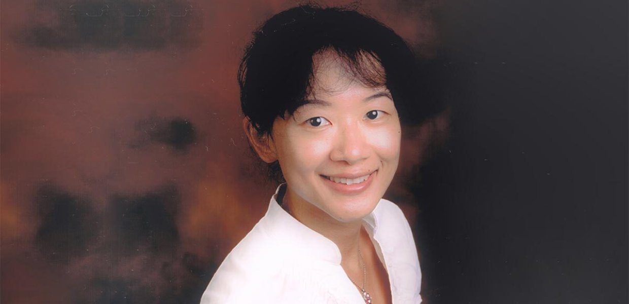 Headshot of Aimei Yang. 