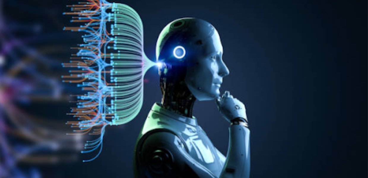 A robot in profile with wires connected to the back of its head