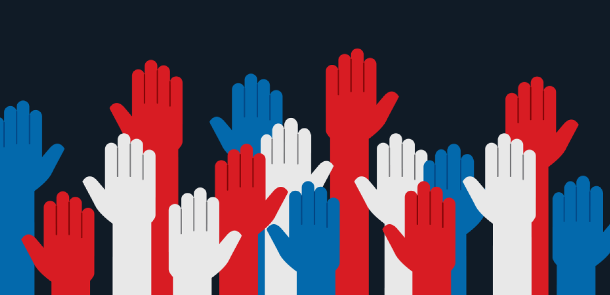 Photo of raised hands in white, blue, and red colors
