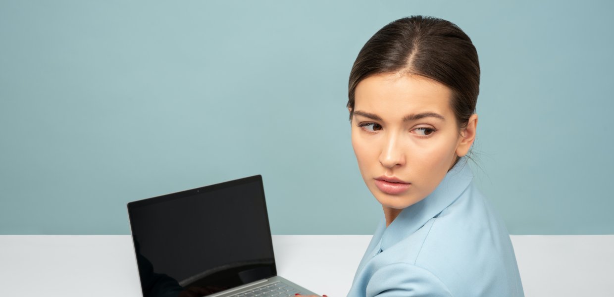 Photo of a person using a laptop