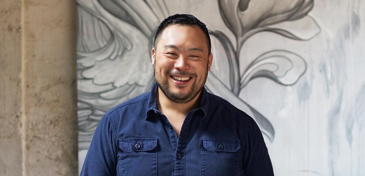 David Chang - Asian male in blue collard shirt smiles for camera