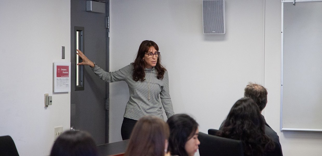 Photo of Ivy Schamis, a history teacher from Marjory Stoneman Douglas High School in Parkland, Florida, as she talks to USC Annenberg students about the mass shooting at her school.