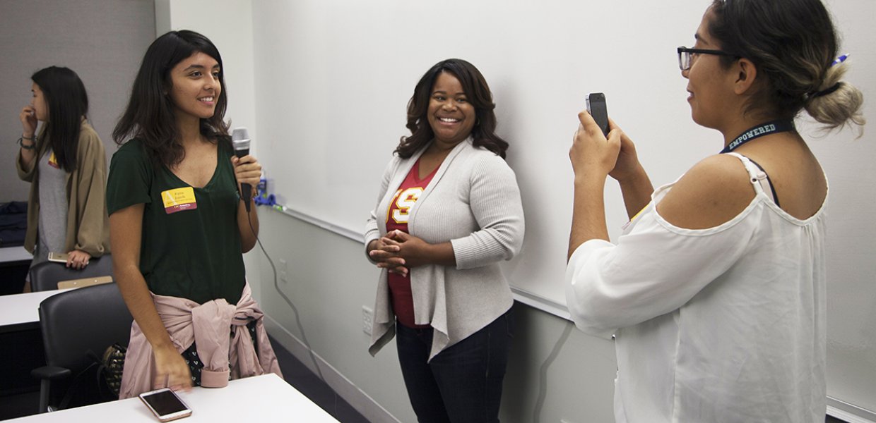 Photo of Allissa Richardson with some high school students for Annenberg high school day