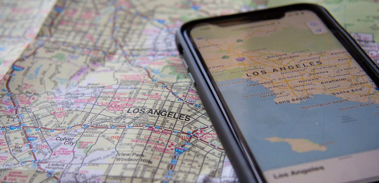 Photo of a Los Angeles map with a gps of a smartphone of Los Angeles also on the map