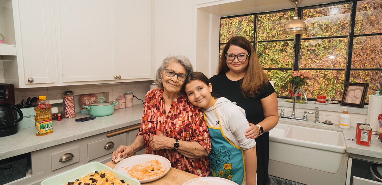 A photo of Professor Amara Aguilar with her daughter and grandmother.