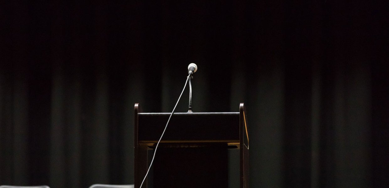 Photo of a microphone on a podium