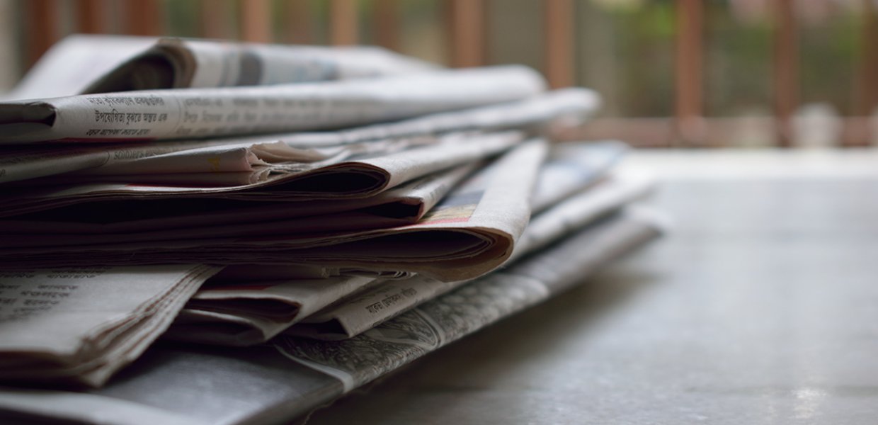 Photo of newspapers in a pile