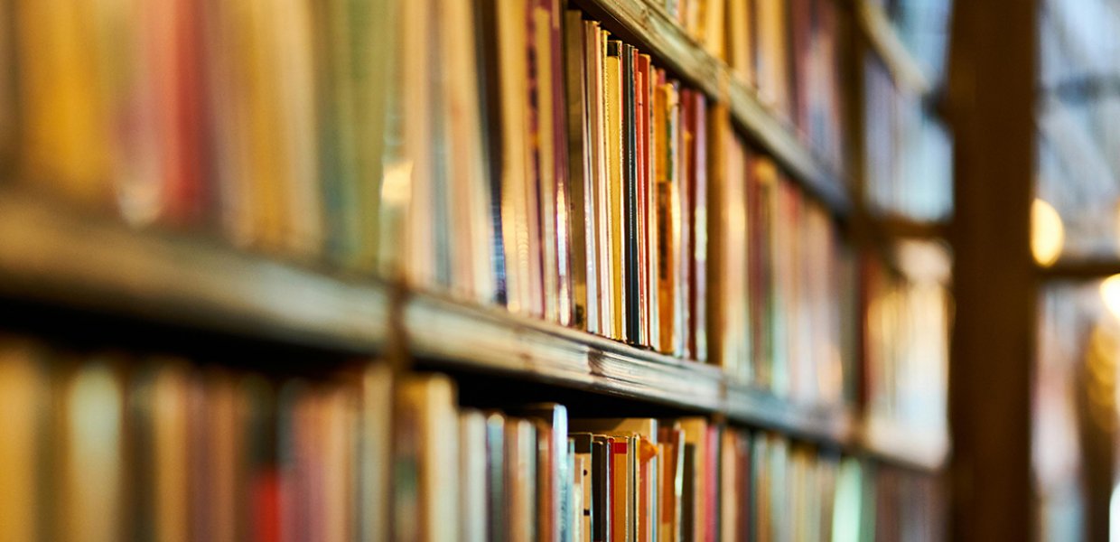 A bookshelf in a library