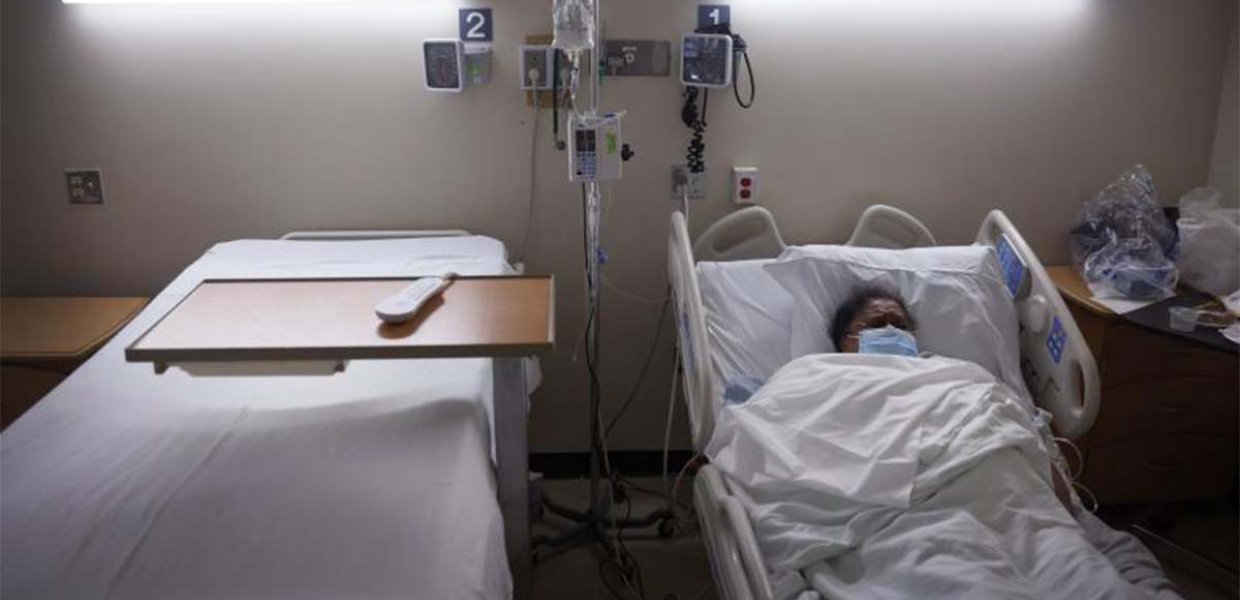 A person in a hospital bed. 