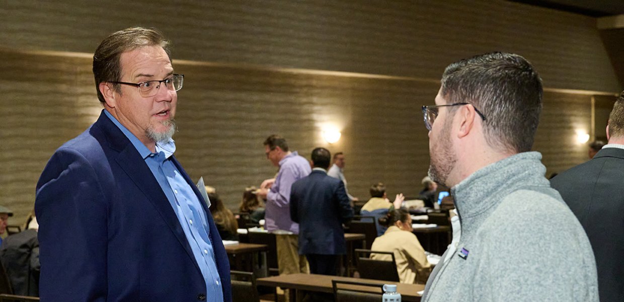 Conference between two men