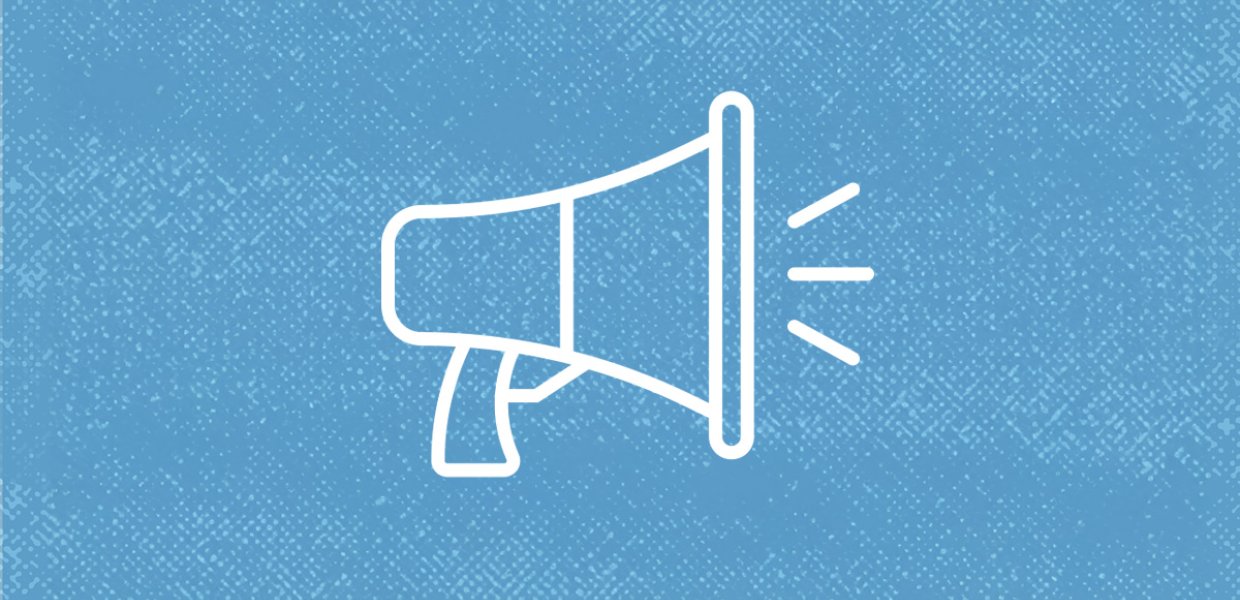 A bullhorn against a blue background