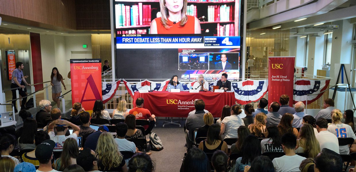 Students watch as Judy Muller, USC Annenberg professor; Antonia Hernandez, CA Community Foundation President/CEO; and Gordon Stables, USC Annenberg Assistant Dean of Student Affairs, discuss their predictions on how the first presidential debate will pan 