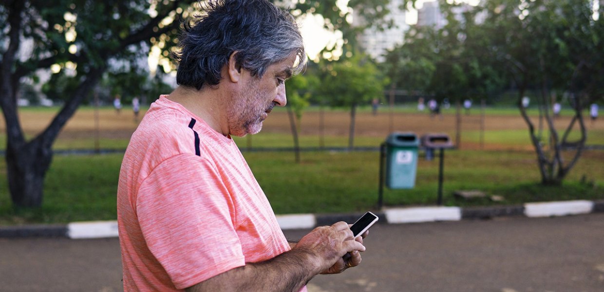Image of elderly man using a cellphone
