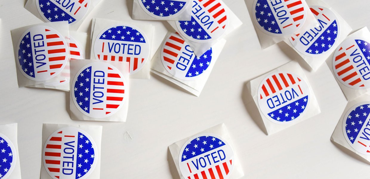 Photo of many "I voted" stickers