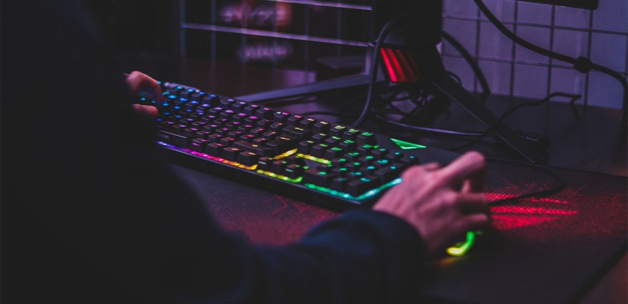 A lit up keyboard and mouse. 