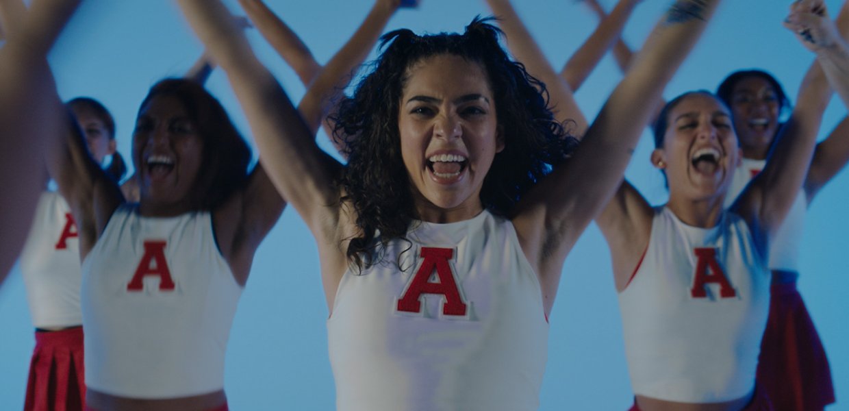Cheerleaders wearing the letter A. 