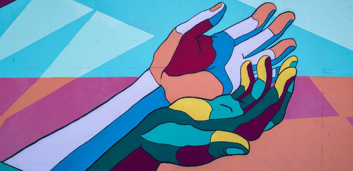 Graphic of two colorful hands