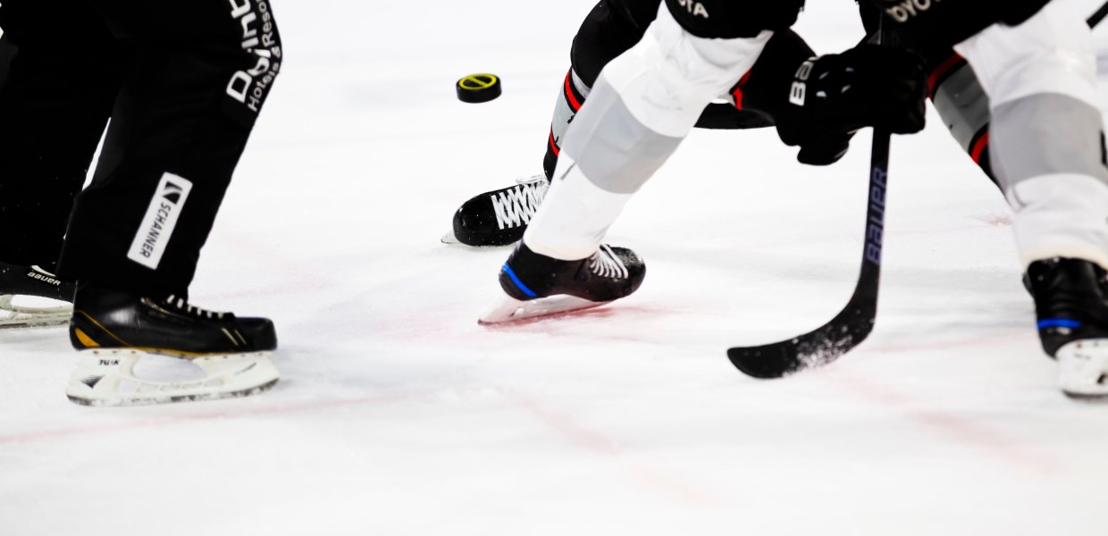 Photo of people playing hockey