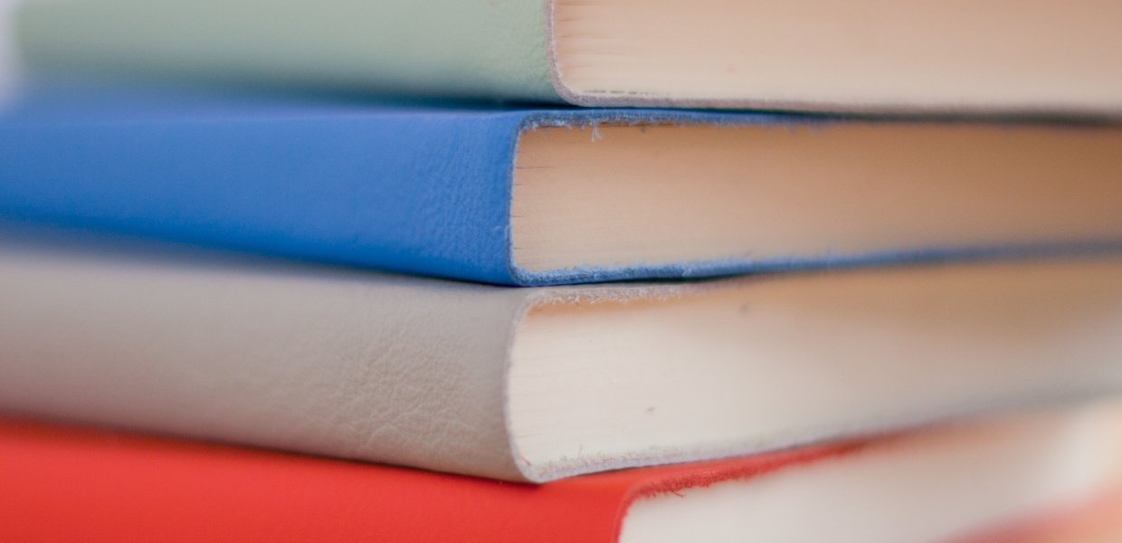 Photo of books stacked on each other