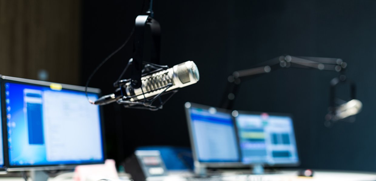 Photo of two computers with two microphones