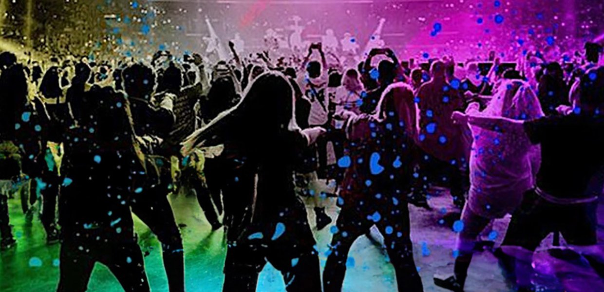 A group of people dancing with a multicolored background