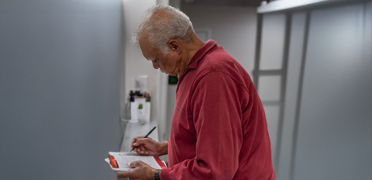 Man filling out a form