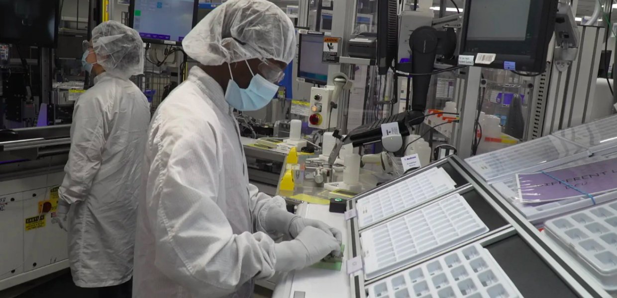Photo of people working in a lab