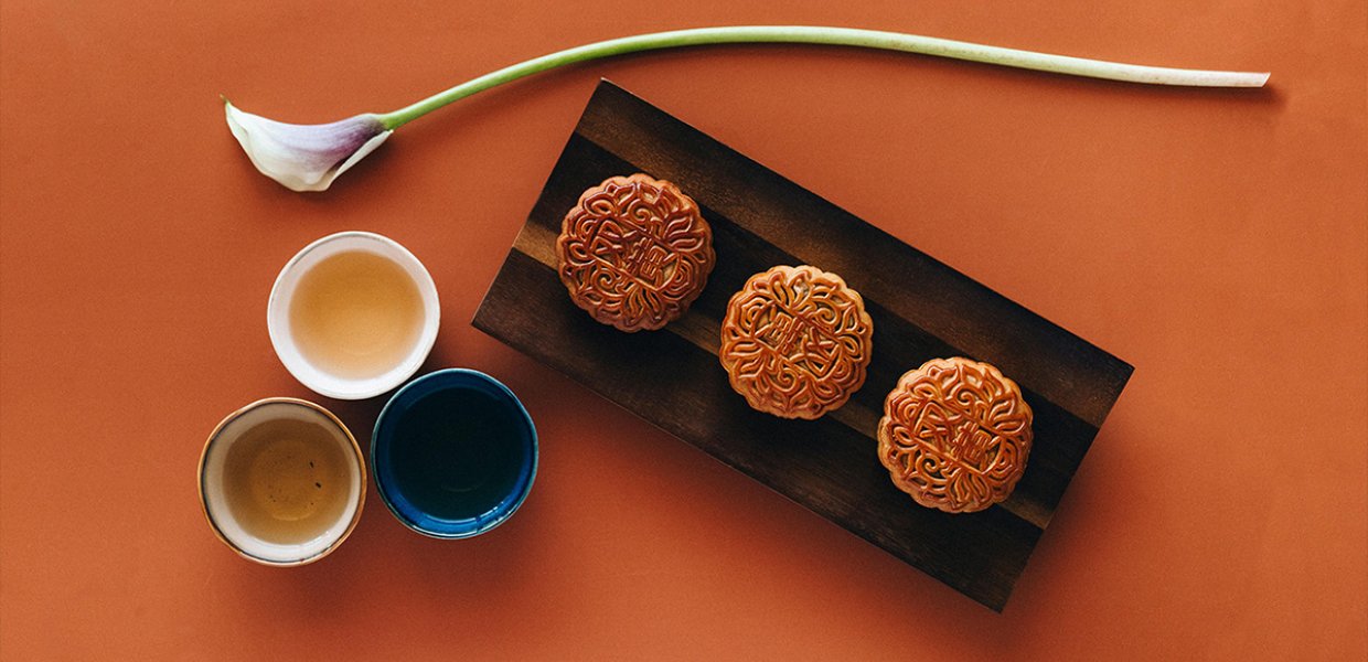 Mooncakes against an orange backdrop