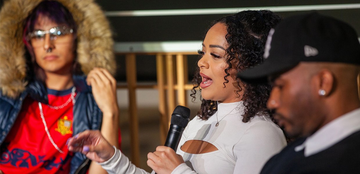 Previous panel in ASC, woman speaking with microphone