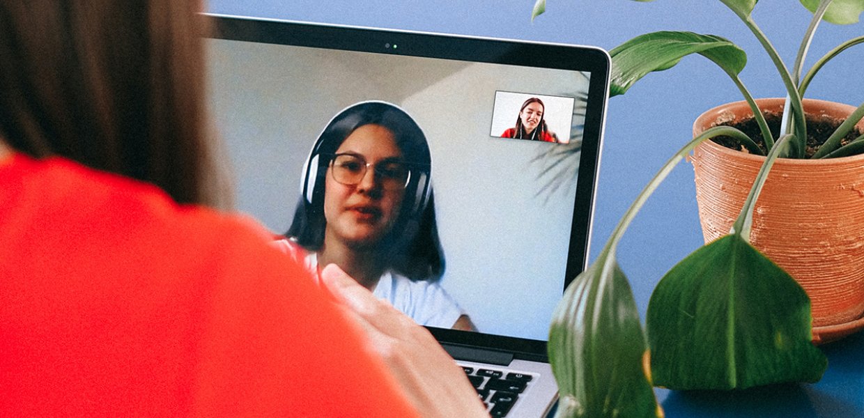 Photo of two people on a video call