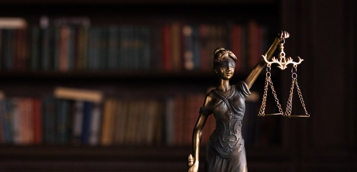 Justice statue on desk