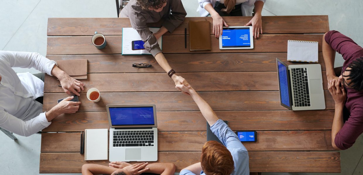 People working at a table together