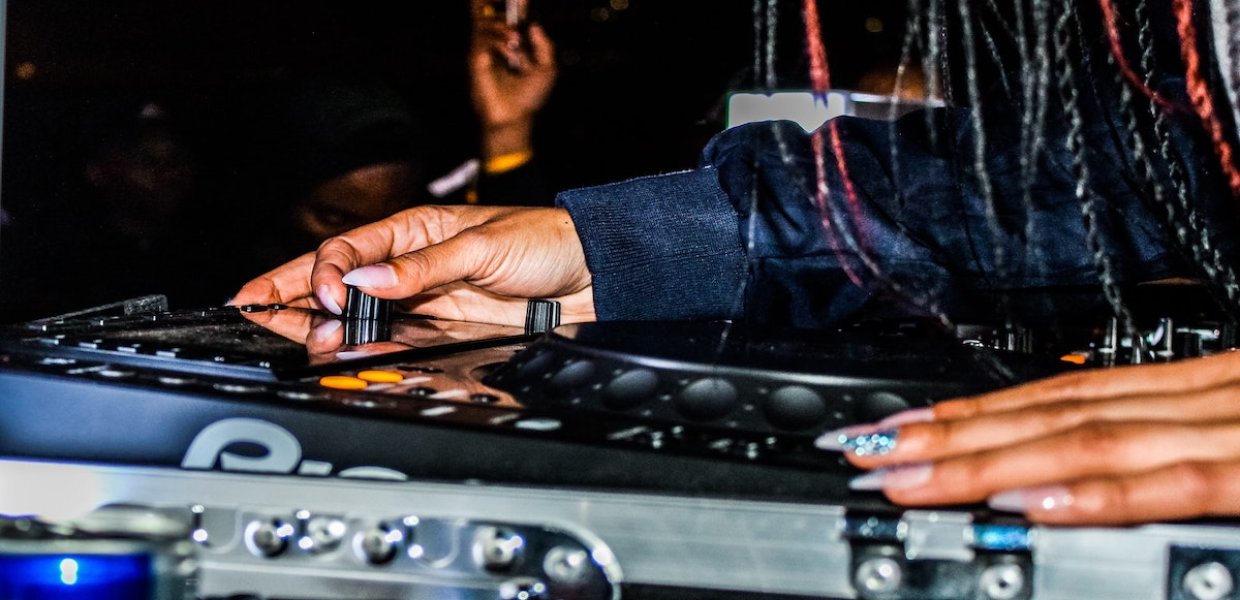 Photo of a person working on a music board