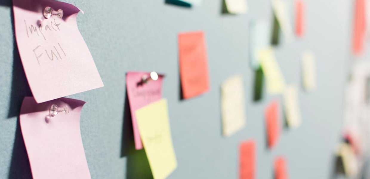 Photo of sticky notes on a board