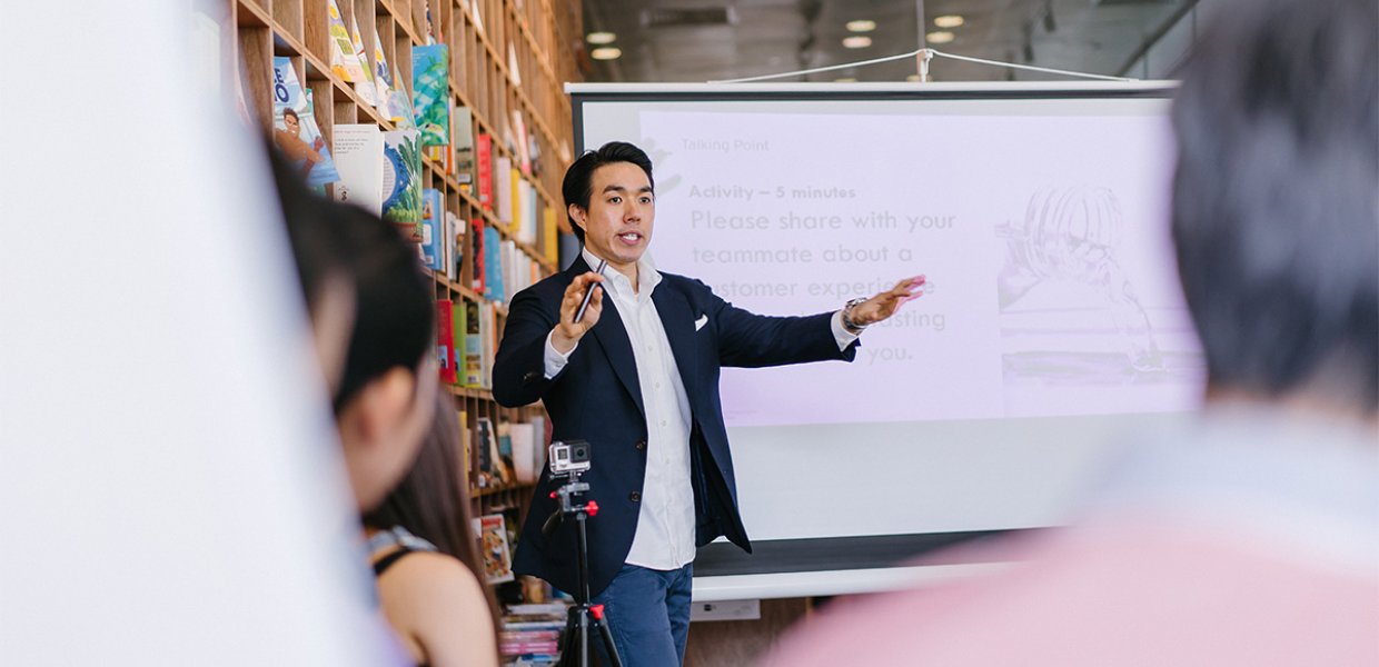A photo of someone giving a presentation.
