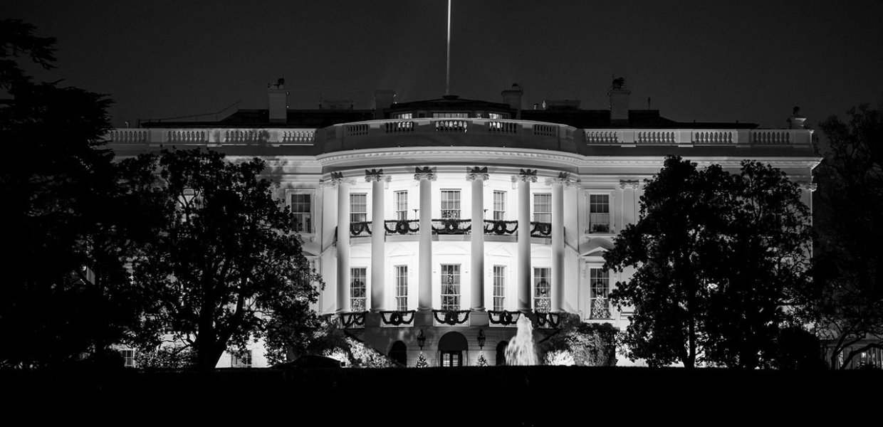 A black and white picture of the White House.