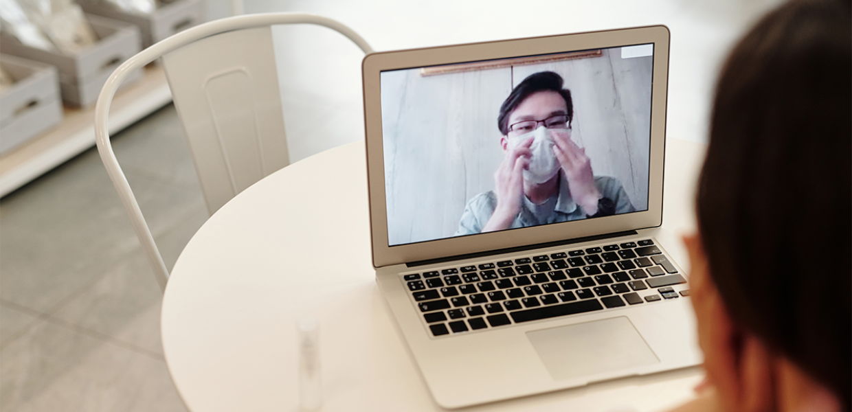 Photo of a person doing a video call on a computer