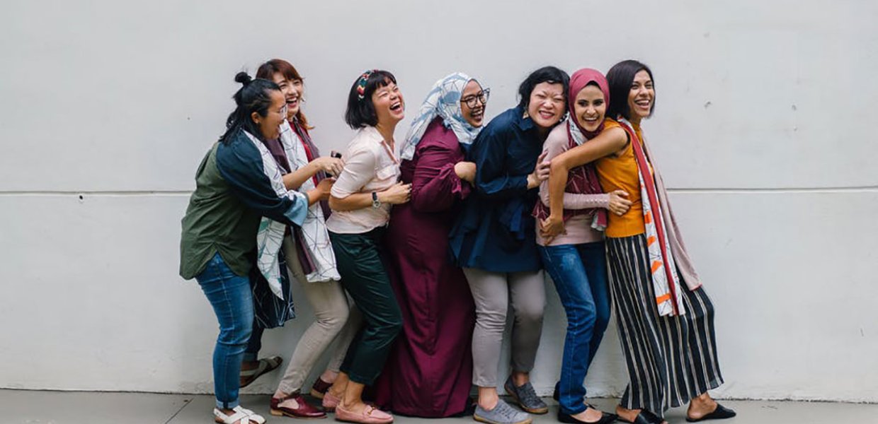 Photo of a group of women laughing