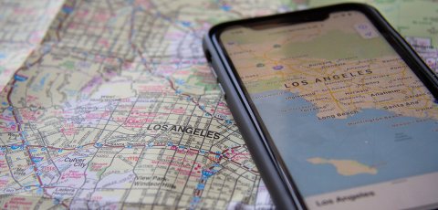 Photo of a Los Angeles map with a gps of a smartphone of Los Angeles also on the map