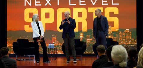 Bloomberg chief correspondent Jason Kelly, center, delivers opening remarks with USC Annenberg Dean Willow Bay and USC Marshall Dean Geoffrey Garrett.