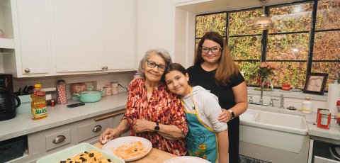 A photo of Professor Amara Aguilar with her daughter and grandmother.