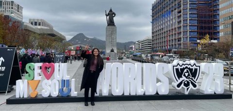 Serena Garcia stands in front of 2023 world gaming sign in Soul, Korea