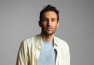 Headshot of Alec Karakatsanis