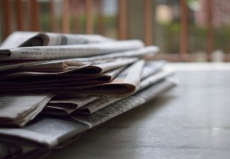 Photo of newspapers in a pile