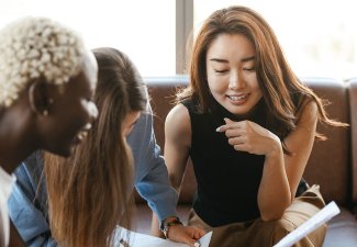 Photo of coworkers speaking