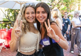 Margaux Dambacher with a friend at the 2023 move-in day reception.