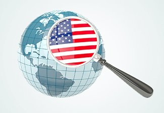 Illustration of a globe with a magnifying glass that holds another illustration of the American flag