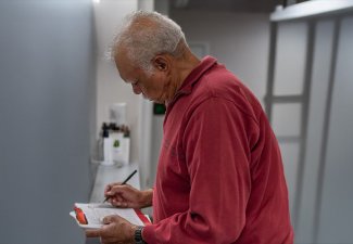 Man filling out a form
