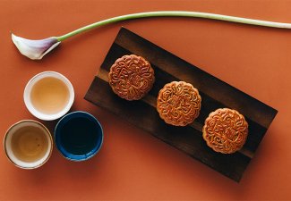 Mooncakes against an orange backdrop